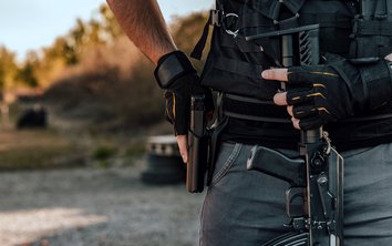 Person with many different weapons 