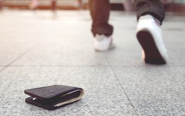 Purse lying on the street