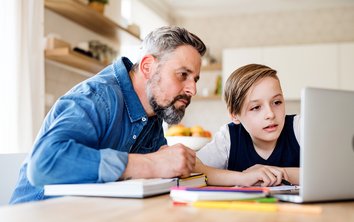 Father and son at the laptop